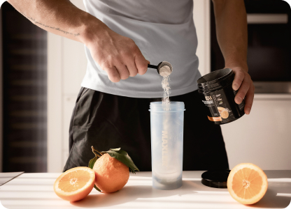 A serving of BCAA+Glutamine being poured into a shaker
