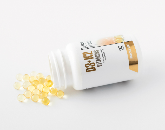 D3+K2 Vitamins bottle and capsules