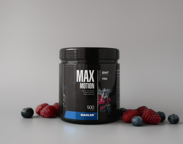 Max Motion Wild Berry 500g can and some berries